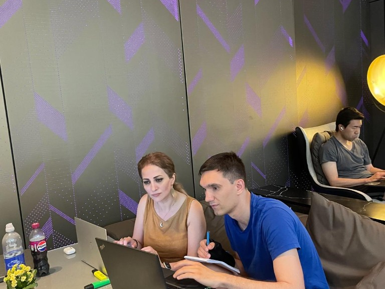 Viktor and Samira drafting the GoodByeScope3 roadmap in the Park Plaza Victoria lobby